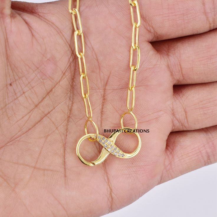 "14k Yellow gold Vermeil infinity Push Lock, Pave Diamond Push Lock Necklace, 925 silver Diamond infinity Necklace Jewelry So here we are present our handmade designer lock for those who wear bracelets or necklaces. It is very easy to use & sometimes we just need the lock to cover our necklace or bracelets. It looks simply adorable even it's too shiny..this lock suitable for all your necklaces or bracelets. The lock design is attractive as it looks.. We give you higher quality at the best pr Infinity Necklace With Lobster Clasp As Gift, Gold Plated Infinity Jewelry As A Gift, Gold Plated Infinity Jewelry Gift, Gold-plated Infinity Jewelry Gift, Dainty Infinity-shaped Gold Jewelry, Infinity Cable Chain Jewelry Gift, Gold Infinity Jewelry Tarnish Resistant, Gold Infinity Jewelry For Anniversary, Tarnish Resistant Infinity Jewelry As Gift