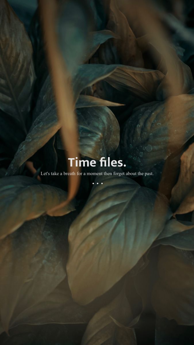 some green leaves with the words time flies