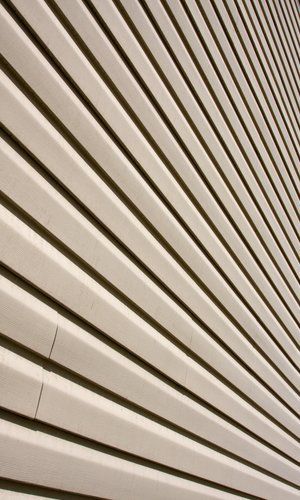 the side of a building with vertical slats on it