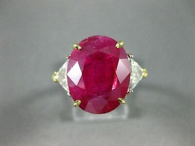 an oval shaped ruby and diamond ring