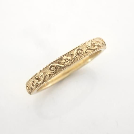 This vintage-inspired ring is inspired by the Italian Baroque style.Handmade and polished, it is available 8K or 14K gold and has a uniquely vintage vibe about it. This ring is designed in 3D and not made out of wire or soldered but cast directly in your size so there are no solder marks on the ring whatsoever. Customization:This band is fully customizable with any text you would like on the inside, at no extra cost. It can also be made in any size, too! Please message me for quarter sizes. Mate Elegant Ceremonial Rings In 14k Gold, Elegant 14k Gold Ceremonial Rings, Heirloom Ring With Decorative Band In 14k Gold, Heirloom 14k Gold Ring With Decorative Band, Elegant Ceremonial Rings With Intricate Design, Heirloom Rings With Decorative Band, Ceremonial Elegant Rings With Intricate Design, Ceremonial Rings With Intricate Design, Victorian Gold Engraved Ring With Decorative Band