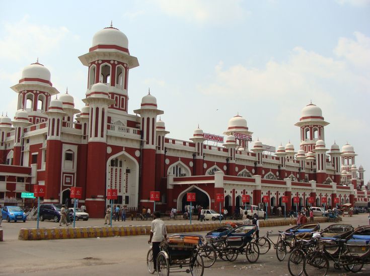 a red and white building with several bicycles parked in front