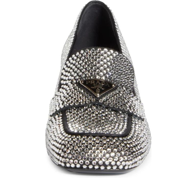 This loafer with triangle logo comes in satin covered in crystals that create plays of light and iridescent glimmers on the surface. Defined by a low heel and square toe, this shoe reimagines the classic penny loafer from a feminine perspective..Crystal embellishmentLogo plaqueRound toeBranded insoleMedium block heelComposition: Fabric 100%, Crystal 100%Lining: Leather 100%Sole: Leather 100%, Rubber 100%Made in Italy Elegant Rhinestone Slip-on Loafers, Formal Leather Loafers With Rhinestones, Luxury Party Loafers With Rhinestones, Formal Loafers With Rhinestones And Round Toe, Luxury Formal Loafers With Rhinestones, Luxury Rhinestone Loafers For Formal Occasions, Elegant Party Loafers With Studded Rubber Outsoles, Luxury Pointed Toe Party Loafers, Luxury Pointed Toe Loafers For Party