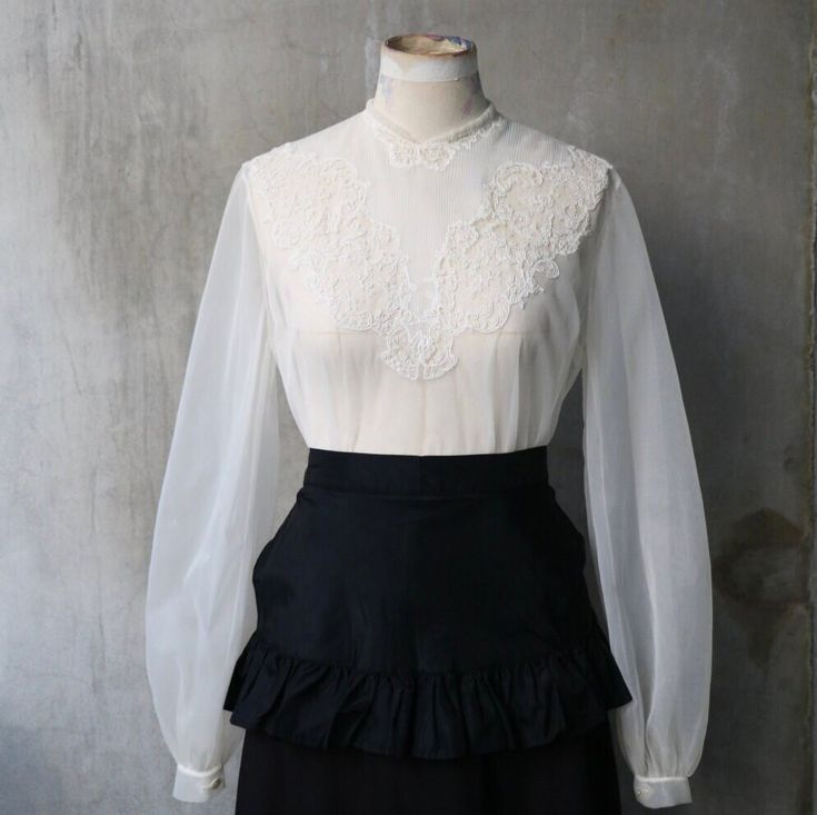 Bust: 40"~43" Waist: 32"~40" This blouse features beautiful lace and ruffles with pleated details around the collar and bust. Issues: Some pinholes. Overall, it is in good condition. - 【Please take note of the following guidelines before making a purchase from us】 1. Orders will be shipped within 5 days with a tracking number provided. 2. International shipping may result in delays, requiring patience from your end. 3. While we do not accept returns or offer refunds, we inspect items thoroughly before shipping. 4. Layaway services are available for purchases over $100, with a non-refundable deposit required. 【Terms and Conditions for Purchasing Vintage Clothing】 1. Customers are required to confirm acceptance of any imperfections in the item before making payment, as all sales are final an Vintage Lace Top With Ruffles, Vintage Lace Top With Ruffles For Spring, Vintage Ruffled Lace Top For Spring, Vintage Long Sleeve Ruffled Lace Top, Long Sleeve Ruffled Lace Top In Vintage Style, Vintage Fitted Lace Top With Ruffles, Vintage Lace Blouse With Ruffles, Vintage Party Blouse With Lace Sleeves, Vintage Lace Blouse With Ruffled Collar