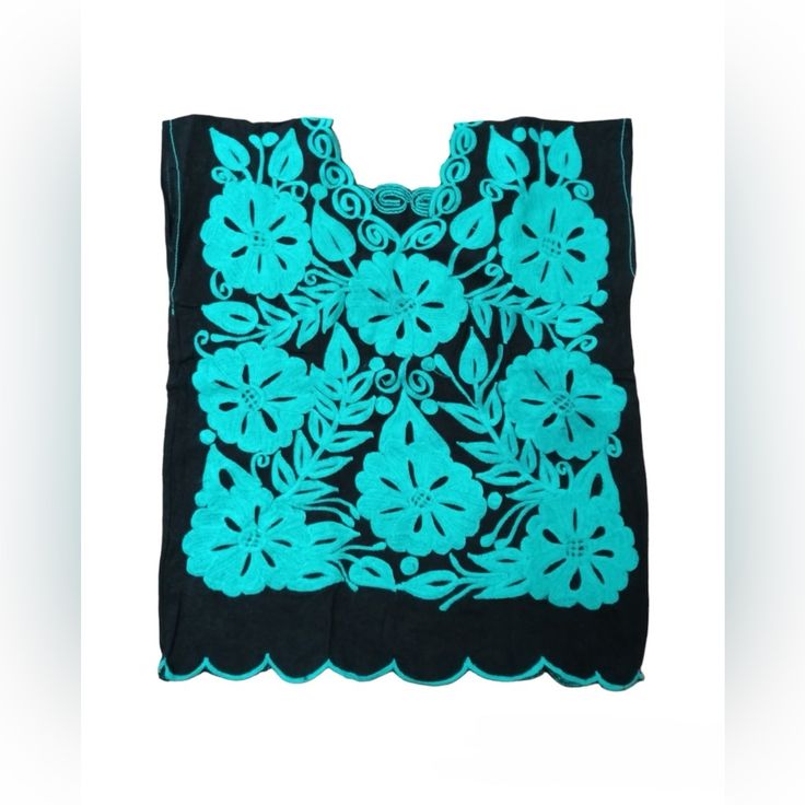 Experience Timeless Fashion With The Christina Top, Made By Chiapas Artisans. This Traditional Mexican Blouse Is Crafted With Cotton Fabric And Features Eye-Catching Large Floral Embroidery. With Its V-Neck Design, It Is Sure To Make A Statement And Never Go Out Of Style. Elevate Your Wardrobe Today! Black Blouse With Intricate Embroidery For Festival, Embroidered Black Beach Blouse, Embroidered Black Blouse For Beach, Traditional Black Top With Motif, Black Floral Embroidered Blouse For The Beach, Traditional Embroidered Black Tops, Black Tops With Intricate Embroidery For Festival, Black Top With Intricate Embroidery For Festival, Black Floral Embroidery Festival Top