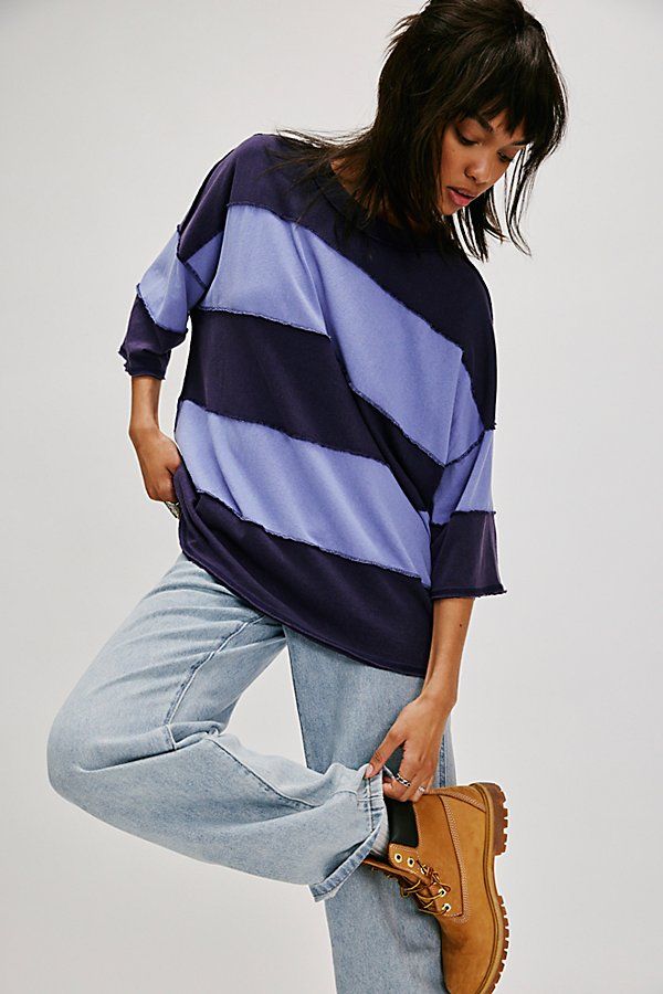 A modern take on a wardrobe staple, this easy tee from We The Free is featured in an oversized style with wide stripes and exposed seams. **Fit:** Relaxed, oversized **Features:** Comfy cotton fabrication, classic crew neckline, drop-shoulder short sleeves, wide stripes, exposed seams **Why We | We The Free Maddie Tee at Free People in Blue, Size: S Oversized Striped Top For Layering, Oversized Tops With Contrast Stripes For Layering, Striped Oversized Top For Layering, Oversized Trendy Top With Contrast Stripes, Trendy Oversized Top With Contrast Stripes, Trendy Oversized Tops With Contrast Stripes, Blue Relaxed Fit Tops With Contrast Stripes, Relaxed Fit Blue Tops With Contrast Stripes, Oversized Spring Top With Striped Hem