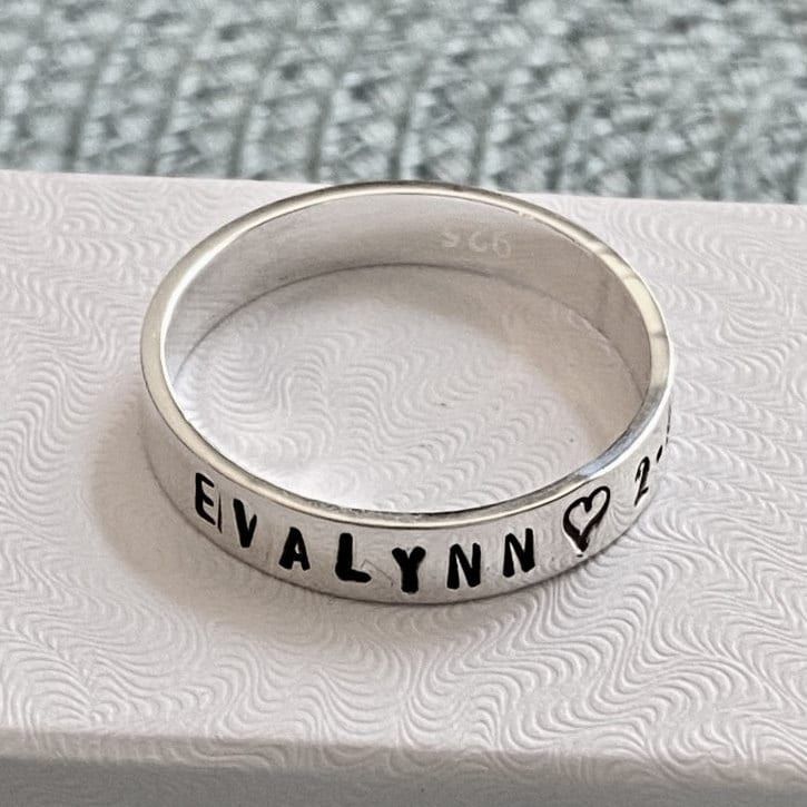 Sterling silver stackable name ring personalized with a name or milestone date- graduation ring, anniversary band, mom or dad ring to cherish a lifetime. - Sterling silver hand stamped ring measures 4mm. - Personalize with up to 12 characters. - Unisex band available in sizes: 5, 6, 7, 8, 9, 10, 11, 12,13,14 They will stretch slightly when stamped, so more letters = more stretching. --------------------------------------- HOW TO ORDER: 1. Select Your Drop Downs. 2. Add to cart. 3. Leave me a not Adjustable Personalized Stackable Rings, Adjustable Initial Ring With Name For Anniversary, Anniversary Sterling Silver Stackable Name Rings, Custom Name Adjustable Stackable Rings For Anniversary, Anniversary Stackable Rings With Names In Sterling Silver, Anniversary Sterling Silver Stackable Rings With Names, Adjustable Stackable Rings With Custom Name For Anniversary, Classic Adjustable Rings With Names, Sterling Silver Name Rings For Birthday