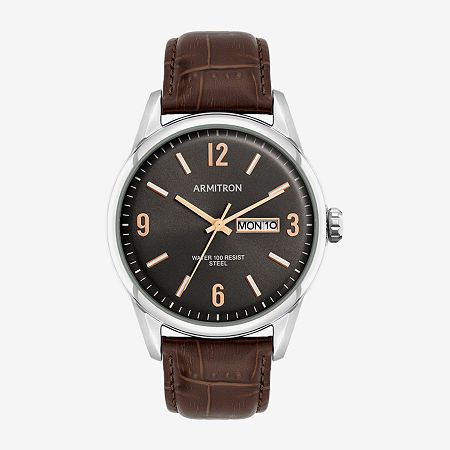 Experience refined craftsmanship with this polished stainless steel watch, featuring a round case with a mineral crystal and textured crown. The cool grey sunray dial is slightly curved, with a sand-printed minute track, bold Arabic numerals at 12, 3, 6, and 9, and luminous stick markers. A day/date window at 3 o'clock and a brown croco grain leather strap complete this elegant timepiece.Number of Batteries: 1Features: Adjustable, Quick ShipBattery Type: Silver OxideJewelry Closure: BucklePower Business Watch Accessories With Date Display In Stainless Steel, Modern Brown Watch With Metal Dial, Formal Brown Watch With Metal Dial, Formal Stainless Steel Watches With Date Display, Modern Watches With Date Display For Anniversary, Modern Anniversary Watches With Date Display, Professional Silver Watches With Subdials, Silver Leather Watch Accessories With Date Display, Formal Brown Watch With Analog Display