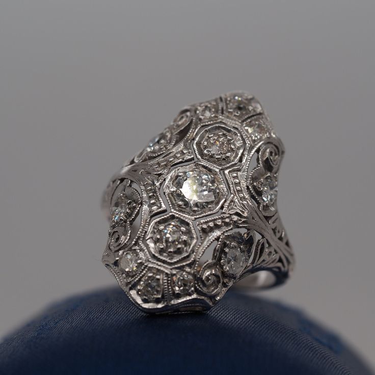 Item Details: Ring Size: 4.25 Metal Type: Platinum  [Hallmarked, and Tested] Weight:  4.1 grams Diamond Details: .60ct, total weight, G Color, VS Clarity, Old European Cut Diamonds (natural) Band Width: 1.5 mm Condition:  Excellent Price: $2250 This ring can be sized up or down 4 sizes for an additional $40. If you wish to have a ring sized please purchase the item and note the size in the message section. Payment & Refund Details: More Pictures Available on Request Payment via Visa/Mastercard/Discover/AmericanExpress, check, money order or PayPal. Layaway *We will be more than happy to provide layaway payments for your convenience to make it easier to have the opportunity to enjoy one of our collection's treasure! Please contact us in advance so we can work out a payment plan best suited Luxury Cluster Diamond Cut Rings, Luxury 14k White Gold Diamond Ring With 17 Jewels, Art Deco Brilliant Cut Diamond Ring Collectible, Art Deco Collectible Diamond Ring With Brilliant Cut, Art Deco Diamond Cluster Ring With 17 Jewels, Collectible Diamond White Platinum Diamond Ring, Collectible Platinum Diamond Ring In Diamond White, Platinum Collectible Diamond Ring, Diamond Cut Dome Ring