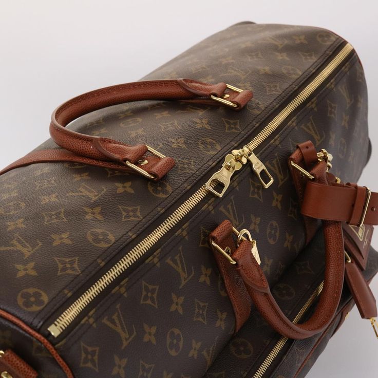 Brand: Louis Vuitton Model: Monogram NBA Gym Bag Boston Bag Color: Brown Material: Canvas Inclusions: Dust Bag / Item Box / Padlock / Key×2 / Clochette / Name Tag / Shoulder Strap Dimensions: W65cm x H35cm x D29cm Serial number: NA Country of origin: Italy Condition: AB - good condition. The Louis Vuitton Brown Monogram NBA Gym Bag in Monogram Canvas exudes sporty elegance and luxury. Crafted from the iconic Monogram canvas adorned with the NBA logo, this Boston Bag showcases Louis Vuitton's com Canvas Travel Bag, Brown Canvas, Boston Bag, Name Tag, Birkin Bag, Monogram Canvas, Gucci Jackie Bag, Vintage Dior, Dior Saddle Bag