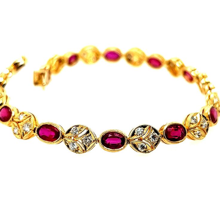 A Magnificent 5.46 carat 18k Yellow Gold Natural Ruby and Diamond Bracelet.  The piece is set with 13 oval natural rubies weighing 4.55 carats, along with 39 natural rounds weighing 0.91 carats.  The length is just over 6.75" inches, and weighs 11.6 grams. Round Diamond Bracelet, Wedding Jewelry Bracelets, Fine Jewelry Bracelets, Natural Ruby, Wedding Bracelet, Natural Red, Round Diamond, Diamond Bracelet, Round Diamonds