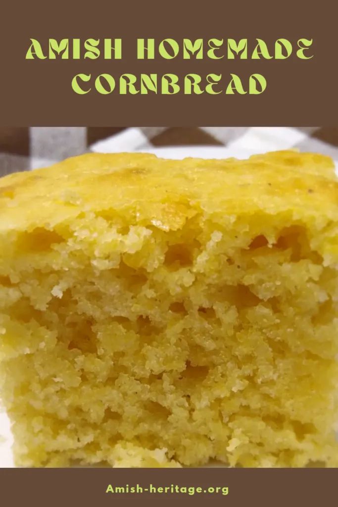 a close up of a piece of cake with the words amish homemade cornbread on it