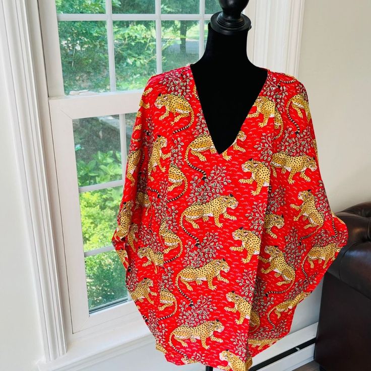 This Kaftan, Made From Incredibly Soft And Lightweight Cotton, Is Versatile For Many Occasions. Perfect For A Swimsuit Cover Up On The Beach Or By The Pool, With Shorts And A Tank Top Or Over A Summer Dress. Can Be Also Worn With A Glam Belt For A More Dressed Up Look For Lunch. It Compliments All Body Types With Its Long, Hangs Loose Design. It Can Be Worn In Many Different Stylish Ways To Make You Look Your Best! The Cotton Tie Accent At The Waist Makes It Easy For You To Wear. Kaftan Item Det Casual Red V-neck Kaftan, Casual Red Printed Kaftan, Silk V-neck Tunic For Summer, Casual Red Tunic For Vacation, Red V-neck Kaftan For The Beach, Red Summer Tunic For Vacation, Red V-neck Tunic For Vacation, Red Summer Vacation Tunic, Red Short Sleeve Kaftan For Beach Cover-up