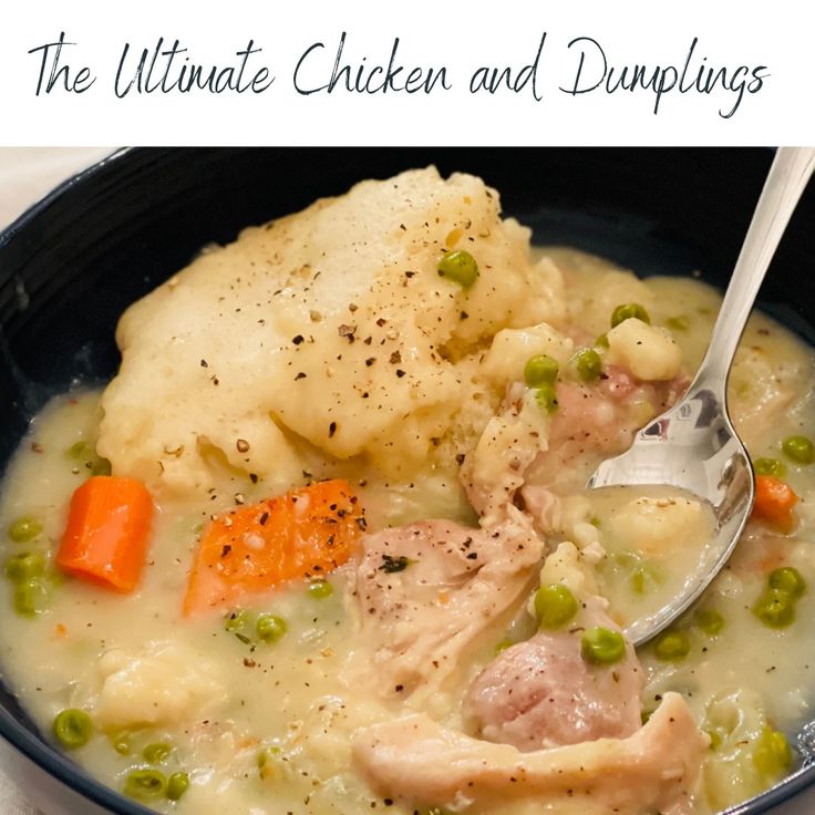 the ultimate chicken and dumplings soup is ready to be eaten with a spoon in it