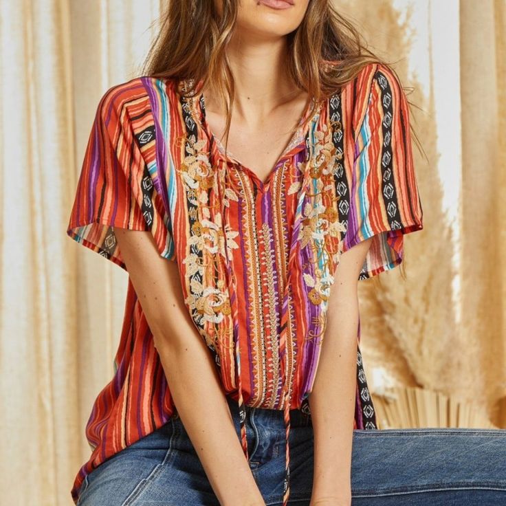 New With Tags Add A Bright Dash Of Style To Your Wardrobe With Savanna Jane's Beautiful Embroidered Top! Featuring A Festive Stripe, Embroidered Neckline And Down Front Of Shirt, Plus A Cheeky Tassel Tie. This Top Is Perfect For Transitioning From Summer To Fall In An Easygoing, Relaxed Style. Put A Little Swing In Your Step And Grab This Top Today! Details Available In Sizes S - L Color: Red Stripe Bodice Floral Embroidery V - Neckline Tassel Tie Closure Short Sleeves Sizing Small: 2/4, Medium: Summer To Fall, Embroidered Neckline, Ruffled Sleeve Top, Tie Top, Sleeves (women), Beautiful Embroidery, Color Stripes, Trendy Tops, Embroidered Top