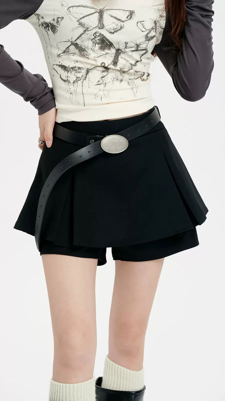 Revamp your wardrobe with the timeless chic of our Pleated Mini Skirt featuring an eye-catching oversized belt detail. This mini skirt channels a blend of sophistication and playful charm with its high-waisted A-line silhouette and crisp pleating. Crafted from a mix of polyester and viscose fibers, it provides both comfort and a flattering drape. The solid color and retro vibe make it a versatile piece for a multitude of settings, from casual outings to more formal affairs. Style this skirt with Oversized Belt, Timeless Chic, Skirt Belt, Professional Look, Pleated Mini Skirt, Retro Vibe, Mini Skirt, Black And Grey, A Line