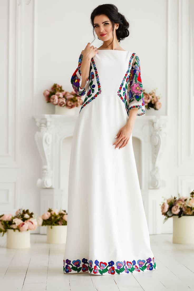 Traditional Maxi Length Embroidered Dress, Traditional Embroidered Maxi Dress With Embroidered Neckline, Elegant Floor-length Dress With Embroidered Border, White Embroidered Maxi Gown, White Embroidered Maxi Length Gown, Elegant Maxi Dress With Embroidered Border, Festive Traditional Maxi Dress With Embroidered Neckline, Festival Maxi Dress With Embroidered Border, Floor-length Floral Embroidered Dress For Eid