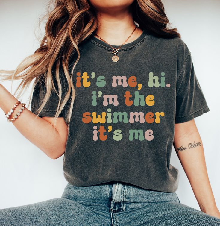 It's Me, Hi I'm The Swimmer It's Me T-Shirt, Swimmer Shirt, Future Swimmer T-Shirt, Gift For Swimmers, Swimmer Shirt, Swimming Swim Shirt , Trending Shirt, Unisex Soft Cotton Tee Welcome to my store! I will help you to have a good shopping experience as much as I can. If you have any request (design customization, more size and color options) please feel free to message me. I will reply as soon as possible. I have listed some information to help you below:  HOW TO ORDER  * Please, Check and Review all Photos. * Select Your T-Shirt Color from drop down menus. * Choose Your Quantity as much as you want. * Click ADD TO CART. And, you can go back to add more product color for your family members and text colors or You can complete the checkout process.  CARE INSTRUCTIONS  For best results, was Grunge Party, Gifts For Swimmers, Swim Shirts, Cute Sweatshirts, Trending Shirts, Text Color, Cotton Tee, Clothing Items, Colorful Shirts