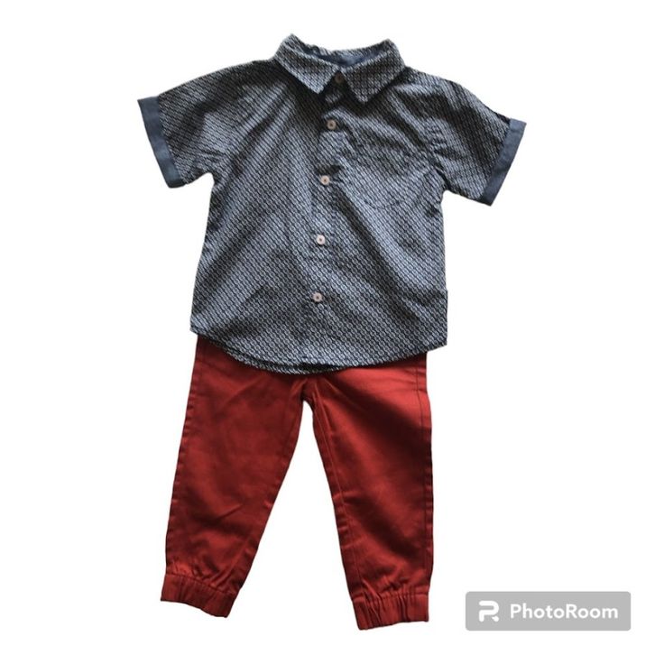 This Shorts-Sleeve Button-Up Shirt And Pant Set Makes Dressing Your Little Gent A Breeze. Chambray Cuffs And Inner-Collar Trim Add An On-Trend Accent. A Classic Button Placket And Logo Tag Complete The Look. Boys Short-Sleeve, Button-Down Shirt And Pant Set Red, White And Blue Pattern. Coordinating Rust Red Colored Pant "Ben Sherman" Script Logo Tag 100% Cotton Machine Washable Blue Collared Sets With Pockets, Cotton Short Sleeve Set With Button Closure, Casual Short Sleeve Sets With Button Closure, Casual Blue Buttoned Sets, Casual Playwear Sets With Pockets, Casual Blue Sets With Buttons, Casual Red Sets With Pockets, Casual Cotton Button-up Sets, Casual Playtime Sets With Pockets