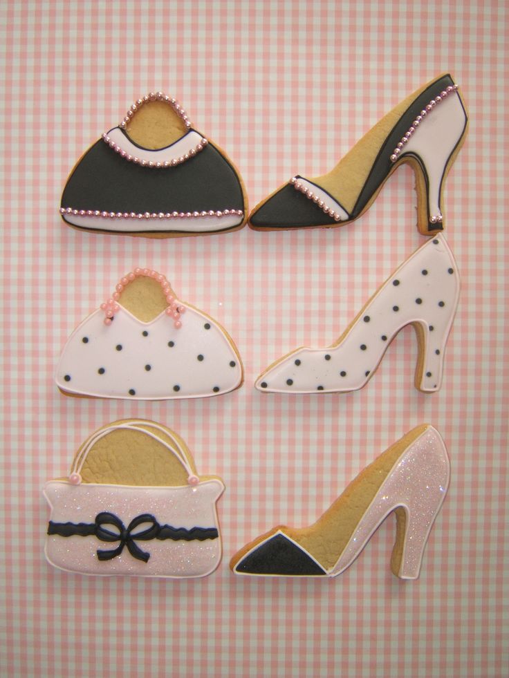 four pairs of high heeled shoes are shown on a pink and white checkered background