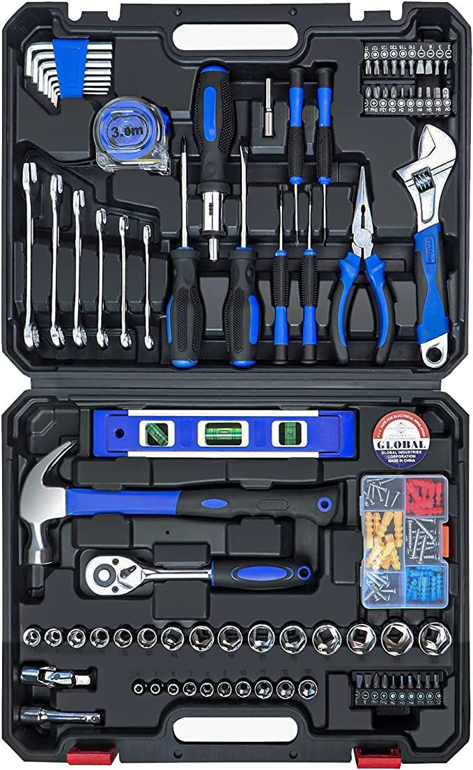 an open tool box filled with tools like wrenches, pliers and other items