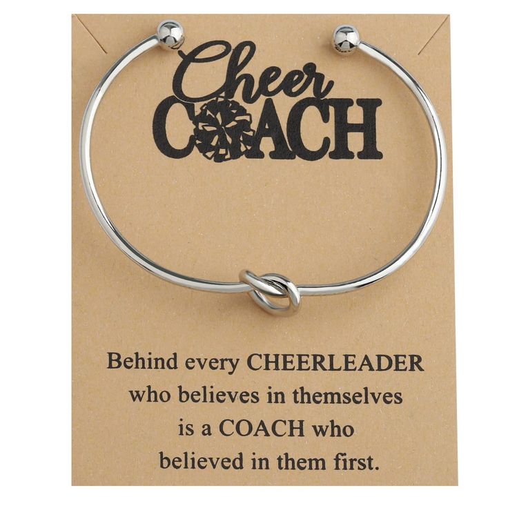 a bracelet with the words cheer coach on it and an image of a dog's paw