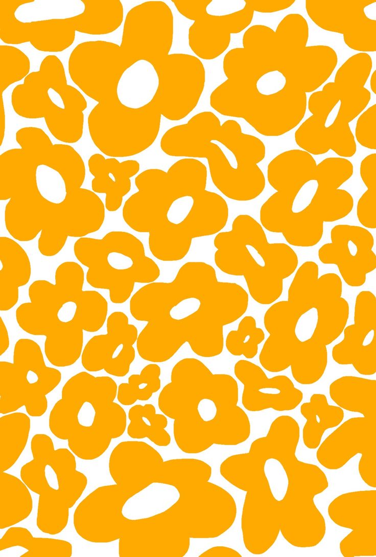 an orange and white flower pattern is shown in this image, it appears to be very large