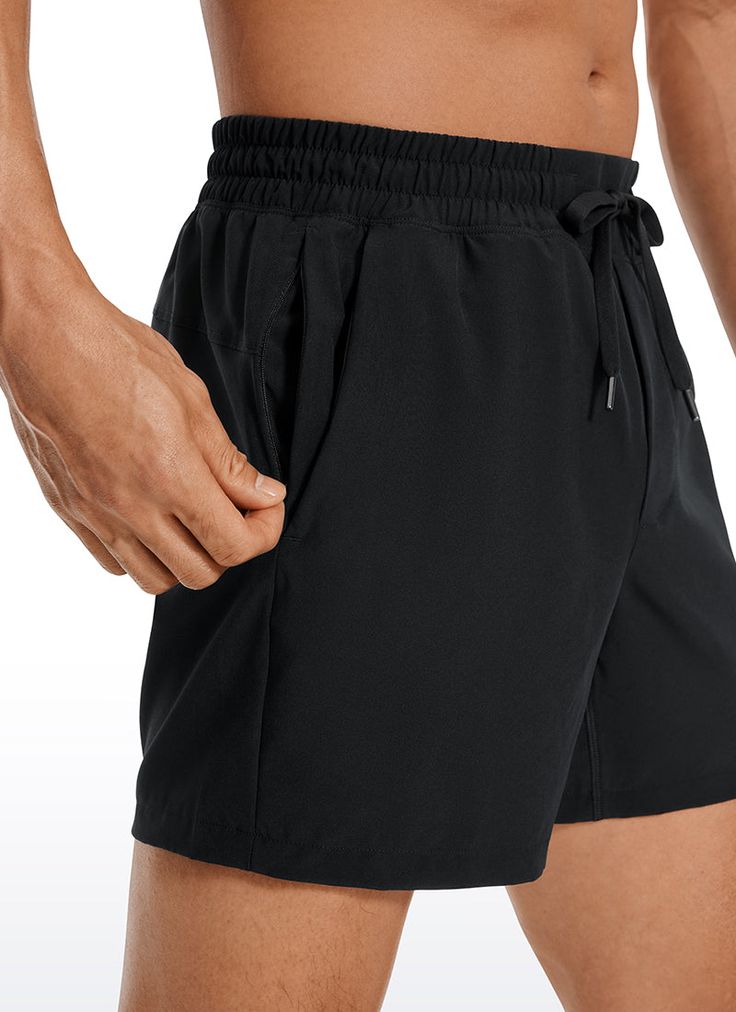 These sports shorts for men are made of lightweight, soft and sweat-wicking fabric. Elastic waistband and drawstring giving you a personalized fit. Multi pockets meet your storage needs. Perfect for workout, running, biking or lounging at home. Feature & Fitting: 
 Feathery-Fit colletction 
 Design for workout or running 
 Mid waist,5 inches 
 Elastic waistband with drawstring 
 Two side pockets & One zip pocket 
 Fabric: 
 Lightweight and super soft 
 Breathable and quick dry 
 Cool to Functional Short Swim Trunks With Built-in Shorts, Sports Swim Trunks With Built-in Shorts, Solid Swim Trunks With Built-in Shorts For Sports, Elastic Waistband Athletic Shorts For Training, Functional Moisture-wicking Swim Trunks For Workout, Functional Swim Trunks With Built-in Shorts, Functional Training Swim Trunks With Moisture-wicking, Breathable Sportswear Swim Trunks For Workout, Training Athletic Shorts With Functional Drawstring