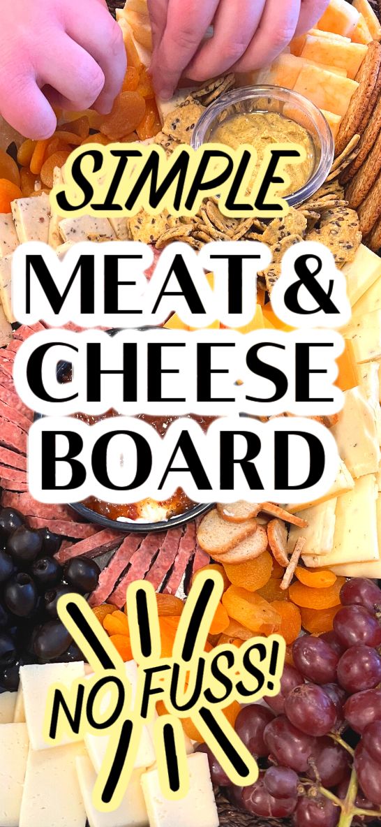 a platter with cheese, grapes and crackers on it that says simple meat and cheese board