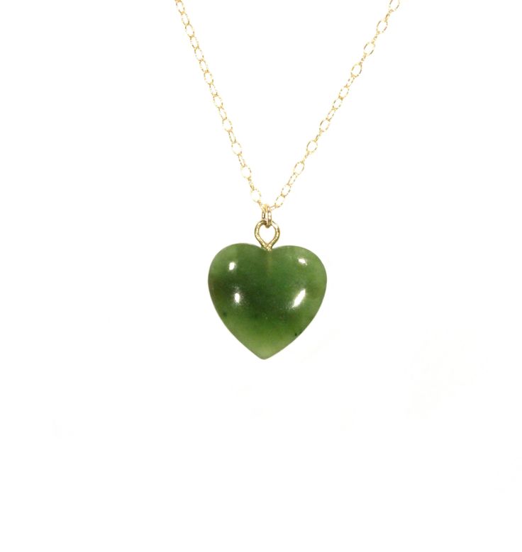 "Jade heart necklace, green heart pendant, Canadian jade pendant, gift for her, natural green stone necklace, 14k gold filled chain A one of a kind Canadian jade heart hanging from a 14k gold filled chain in the length of your choice! Please choose your favorite heart as shown in the fourth photo. The jade pendant measures 15mm. Need a few reasons to love green jade other than for its beauty? ♥ Stability ♥ Longevity ♥ Fertility ♥ Serenity ♥ Wisdom ♥ Practicality ♥ Tranquility ♥ Balance ♥ Peace ♥ Green Heart Charm Necklace As A Gift, Green Heart Charm Necklace For Gift, Dainty Green Heart Pendant Necklace, Dainty Green Heart Jewelry, Green Heart Cut Necklace For Gift, Green Heart Pendant Necklace As Gift, Green Heart-shaped Gemstone Necklace, Green Heart Pendant Necklace Gift, Handmade Green Heart-cut Jewelry