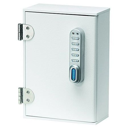 a white cabinet with two keys on the front and one key in the back that is open