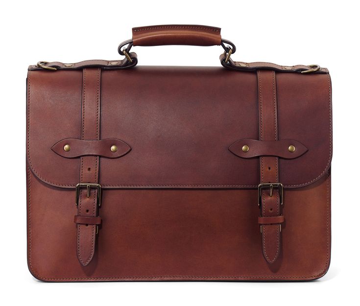 Esq. Briefcase by Jackson Wayne made of full grain semi-vegetable tanned leather front view in vintage brown color - a classic vintage design lawyer's briefcase Classic Cognac Shoulder Bag With Palladium Hardware, Brown Briefcase With Palladium Hardware For Work, Brown Palladium Hardware Briefcase For Work, Luxury Satchel Briefcase With Brass Hardware, Timeless Brown Briefcase With Palladium Hardware, Classic Cognac Briefcase For Formal Use, Luxury Business Satchel With Brass Hardware, Luxury Satchel With Brass Hardware For Business, Classic Cognac Satchel For Business Trips