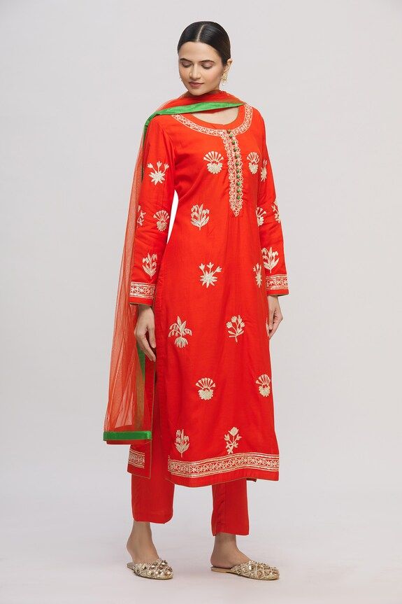 Red tinted orange straight long kurta with all-over floral motif gold tone gota work. Comes with pants and dupatta.
Components:3
Embroidered
Neckline:Round
Sleeve Length:Full
Fabric:
Color:Red
Green loop button placket
Side slits
Cuff sleeves
 - Aza Fashions Red Kurta, Long Kurta, Kurta Set For Women, Gota Work, Embroidered Neckline, Kurta Set, Cuff Sleeves, Aza Fashion, Button Placket