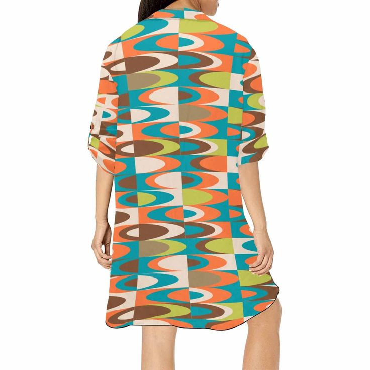 Be a total beach babe in this 50s Mid-Century Retro Shirt Dress Cover Up! Perfect for that all-important summer 'fit, it's the perfect way to stay cool, comfy and trending. Wherever your summer takes you this year, you'll be ready for fun in the sun. Rock it with sunglasses and a statement hat! Made of 100% polyester chiffon, light and cool. Features V-neck, half sleeves, chest pocket, mid-length A little see-through. Deep V-neck Loose fit Chest pocket for keys, telephone, tissues, and other sma Summer Dresses With Graphic Print And Relaxed Fit, Retro Printed Vacation Dresses, Retro Summer Beach Dresses, Retro Beach Dresses For Summer, Retro White Beach Dress, Retro Summer Day Out Dress, White Retro Beach Dress, Retro Summer Dresses For Day Out, Retro Summer Dress For A Day Out