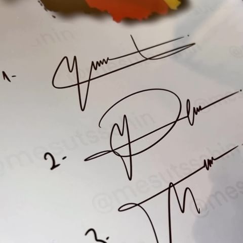 the autographed signatures of two people are shown