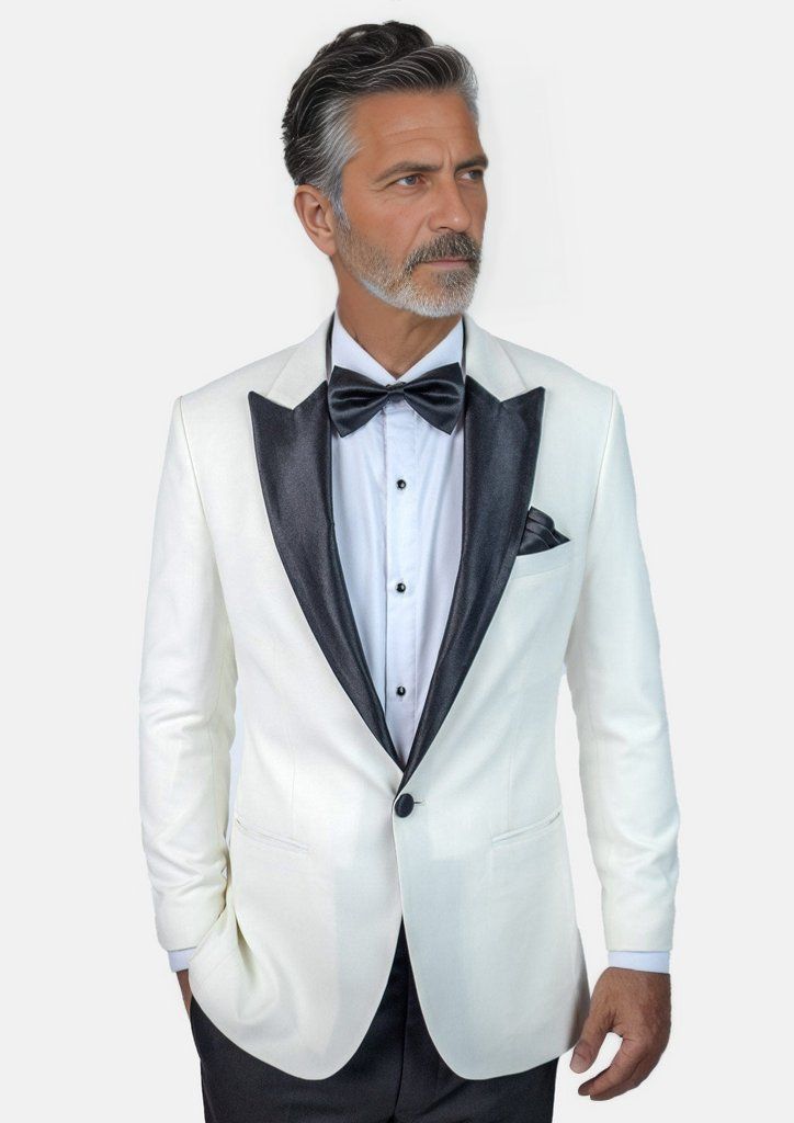 This Alabaster White Twill Tuxedo is the epitome of fashion style and sophistication. Crafted with meticulous attention to detail, this custom-made tuxedo will be a stunner. Enjoy the ultra formal look with this exquisite white tuxedo, fully customizable for you. Black satin peak lapels and accents distinguish this one button look - well paired with a black or white vest underneath. Tailored Tuxedo With Notch Lapel, Tailored Notch Lapel Tuxedo, Elegant Tuxedo For Gala And Formal Occasions, Elegant Tuxedo For Gala Events, Elegant Formal Tuxedo For Gala, Elegant Gala Tuxedo For Formal Occasions, Elegant Suits For Black-tie Gala Events, Fitted Notch Lapel Tuxedo For Wedding, Elegant Notch Lapel Suit For Wedding