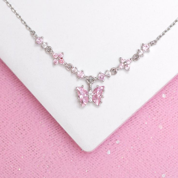 Cute Pink Clavicle Chain Jewelry, Cute Butterfly-shaped Jewelry For Parties, Party Butterfly Necklace With Adjustable Chain, Butterfly Shaped Necklace With Chain As Gift, Dainty Silver Butterfly Necklace For Party, Elegant Pink Butterfly Clavicle Necklace, Cute Silver Jewelry With Butterfly Charm, Feminine Pink Necklace With Adjustable Chain, Pink Clavicle Chain Charm Necklace For Party