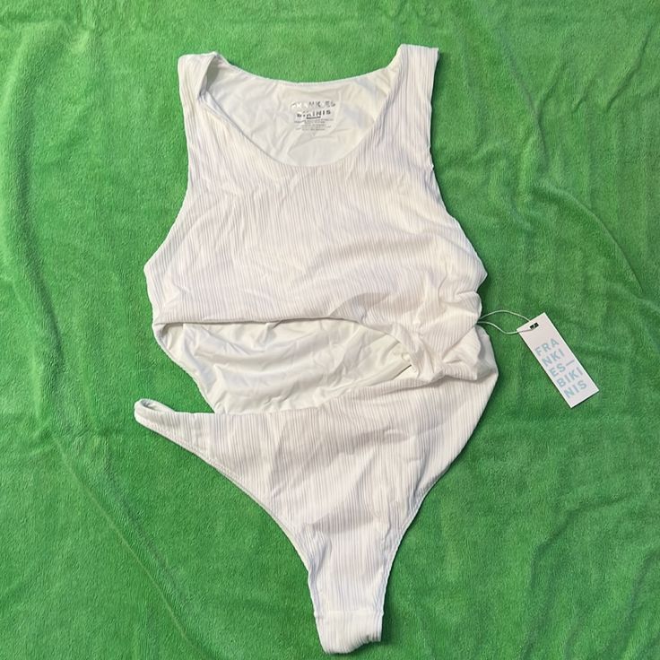 White Beautiful Cutout Suit. Never Worn, New W Tags One-piece Beachwear Top For Poolside, Fitted Casual Bodysuit For Sunbathing, One-piece Stretch Tops For Swimming, Chic Sleeveless Bodysuit For Sunbathing, Fitted Tank Top For Beach Season, Stretchy Beach Top, Sleeveless Beachwear Tops For Sunbathing, White Sleeveless Seamless Swimwear, Sleeveless Seamless Bodysuit For Sunbathing