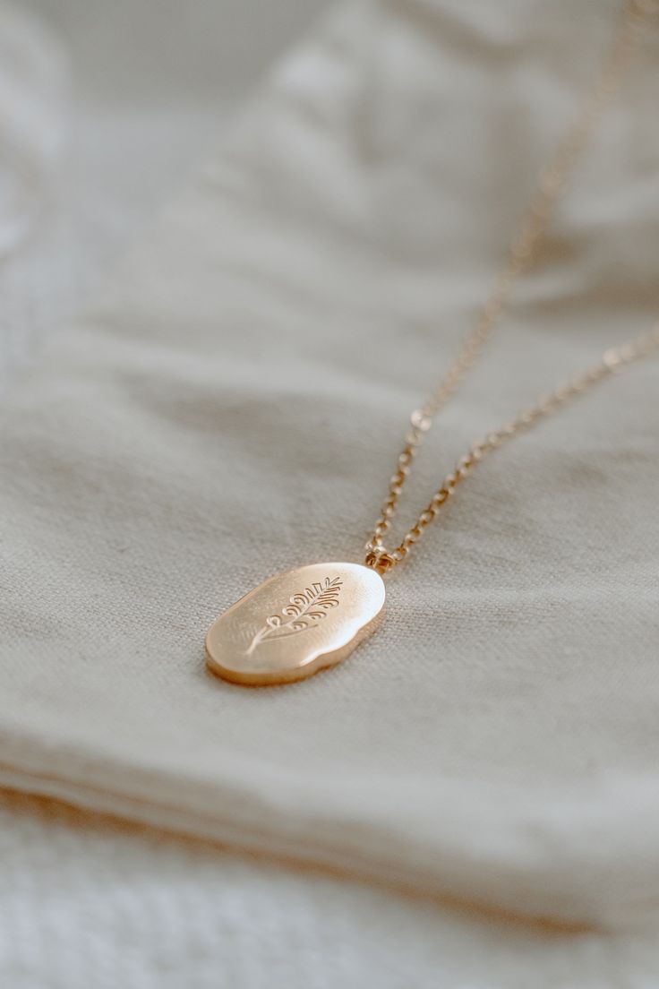 Adorn your neck with our gold filled birth flower necklace. This statement piece is 18k gold filled and can be totally dressed up or down! Great for layering with other necklaces or even wearing on its own for a dainty and minimalistic look!  * * * * * * * * * * * * * * * * * * * * * * * * * * * * * * * * * * * * * * * * * *  M A T E R I A LS   A N D   C A R E  This necklace is gold filled with high quality 18K gold. It will not tarnish when exposed to water, but we recommend removing it when sw Delicate 14k Gold Filled Engraved Necklaces, Delicate Engraved 14k Gold Filled Necklaces, Delicate Engraved 14k Gold-filled Necklaces, Dainty 14k Gold Filled Engraved Charm Necklaces, Dainty 14k Gold Filled Engraved Charm Necklace, Dainty Engraved 14k Gold Filled Charm Necklaces, Delicate 14k Gold Filled Tarnish Resistant Charm Necklaces, Delicate 14k Gold-filled Tarnish-resistant Charm Necklaces, Delicate 14k Gold-filled Charm Necklace, Tarnish Resistant