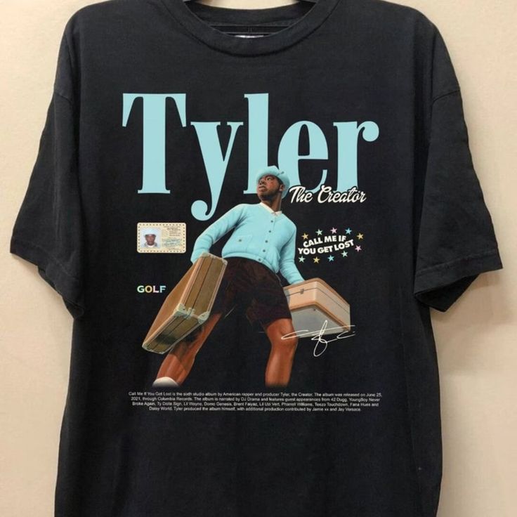 a t - shirt that says tyler the creator with a man carrying suitcases on it