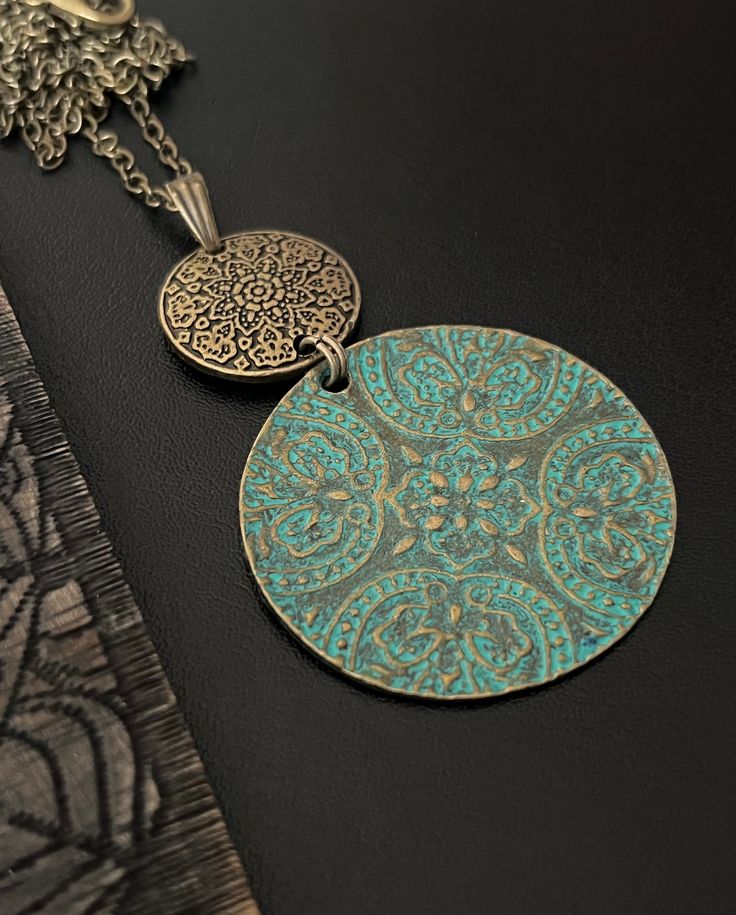 20 inches Chain  Patina Disc Charm  Boho Necklace, Ethnic Style Necklaces, Disc Pendant Necklaces, Patina Charms, Statement Necklaces, Bohemian Necklaces, Antique Gold Necklace Bohemian Bronze Pendant Jewelry, Bronze Bohemian Pendant Jewelry, Artisan Medallion Necklaces With Oxidized Finish, Artisan Style Medallion Necklaces With Oxidized Finish, Artisan Medallion Necklace With Oxidized Finish, Unique Medallion Necklaces For Festivals, Bohemian Silver Necklaces With Patina, Bohemian Style Silver Necklaces With Patina, Bohemian Jewelry With Patina As A Gift