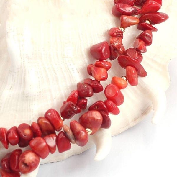 Experience the elegance and power of natural beauty with these exquisite red stones!  Discover the allure of our Red Stone Bead Necklace, Bracelet, and Earring Set. Handcrafted from semi-precious red coral stones, this stunning collection is designed to elevate your appearance and boost your self-assurance.  The red coral stones are celebrated for their ability to enhance courage, self-esteem, and vitality, making this set an ideal accessory for any challenge life throws at you.  Featuring high- Hand-strung Red Coral Jewelry For Gifts, Hand-strung Red Coral Jewelry As A Gift, Hand-strung Red Coral Jewelry Gift, Gift Jewelry With Hand-strung Red Coral, Red Natural Stones Jewelry For Healing, Red Coral Jewelry With Natural Stones In Round Beads, Red Spiritual Jewelry With Gemstone Beads, Red Hand-strung Jewelry For Healing, Red Hand-strung Healing Jewelry