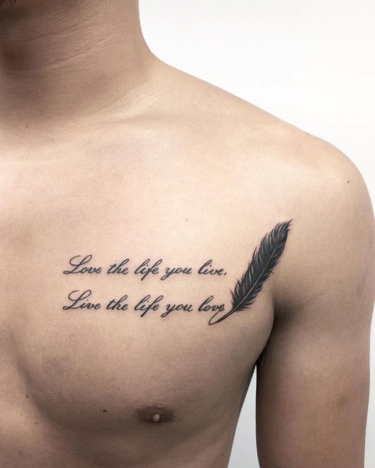 a man with a feather tattoo on his chest saying love is the life you live