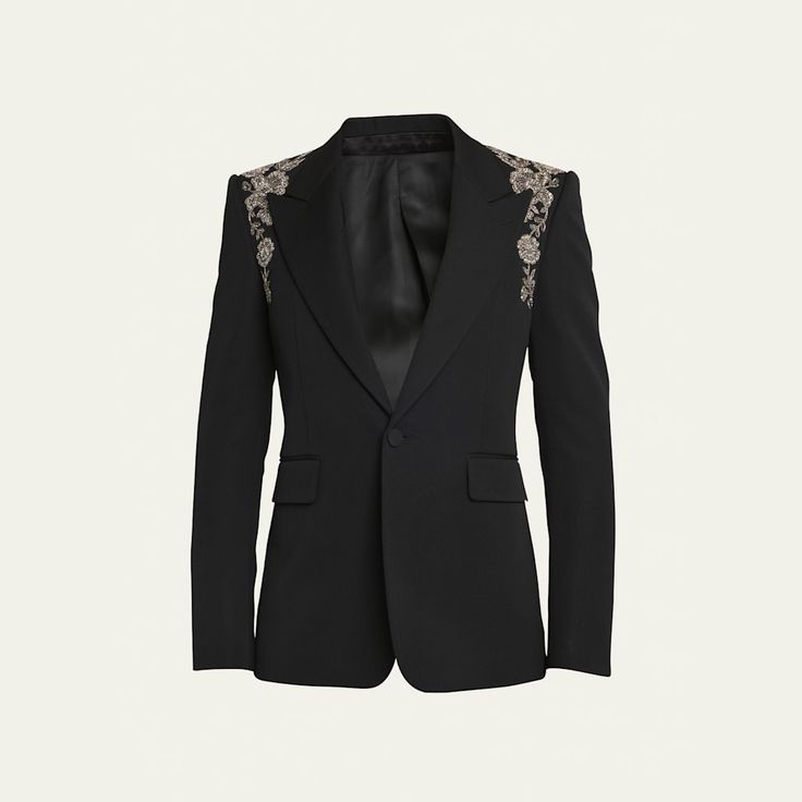 Alexander McQueen tuxedo jacket with floral embroidered harness  Peak lapels Single-button closure Hip flap pockets Four-button cuffs Center back vent Wool Dry clean Made in Italy Designer Semi-formal Embellished Blazer, Luxury Formal Outerwear With Floral Embroidery, Tailored Embellished Blazer For Semi-formal Occasions, Luxury Floral Embroidered Formal Outerwear, Luxury Floral Embroidery Formal Outerwear, Luxury Embellished Long Sleeve Tuxedo, Elegant Party Blazer With Floral Embroidery, Formal Tailored Blazer With Floral Embroidery, Formal Fall Embroidered Blazer