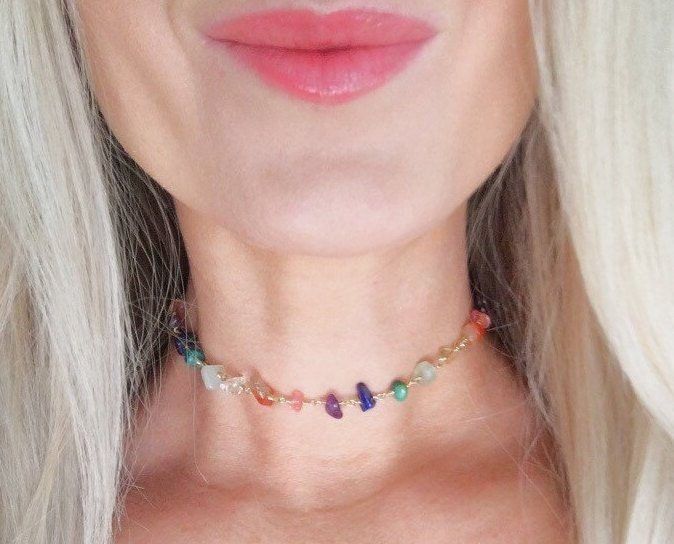 This rainbow gemstone necklace supports and balances all of your chakras! 7 different natural gemstones are individually wrapped by hand in your choice of sterling silver, 14k gold filled or 14k rose gold filled wire, and strung together to create a strand of chakra balancing sparkle for your neck. Necklace is made with the following 7 colorful stones, 1 for each chakra in the body: pink tourmaline, orange carnelian, yellow citrine, green peridot, turquoise, blue lapis lazuli, and purple amethys Collar Hippie, Rainbow Choker, Selenite Necklace, Pride Necklace, Festival Necklace, Pride Jewellery, Gemstone Hoop Earrings, Diy Jewlery, Wrist Jewelry