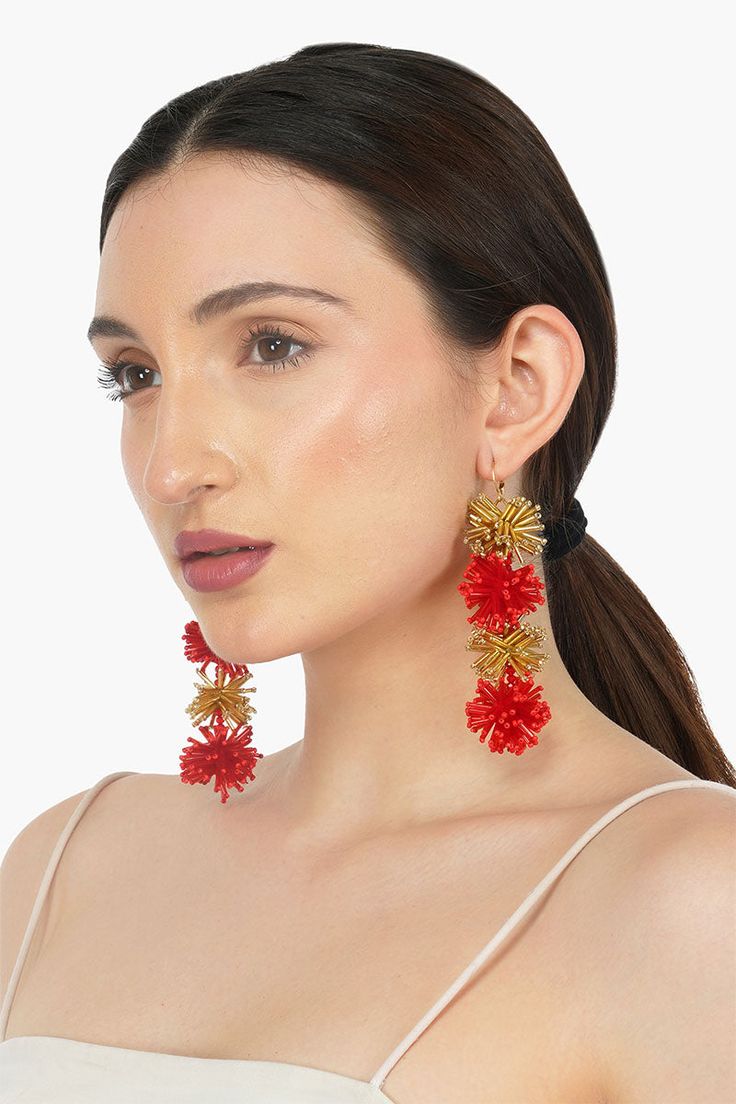 Beaded handmade earrings in a round layered shape in red and gold Top attachment Jumring with little Ring Handcrafted in Gold and Red Colours Elevate your style and make a statement with our Omnia Beaded Earrings, the perfect accessory to complement your unique sense of fashion and bring an air of glamour to any occasion. These handmade earrings feature a captivating round layered shape, meticulously crafted with intricate beadwork in rich shades of red and gold.For easy and secure wear, the ear Trendy Christmas Party Jewelry, Red Gold Beaded Drop Earrings, Elegant Red Earrings With Gold Beads, Trendy Gold Festive Jewelry, Trendy Gold Jewelry For Festive Occasions, Trendy Red Jewelry For Festive Occasions, Trendy Red Festive Jewelry, Red Beaded Jewelry For Party, Party Beaded Earrings With Dangling Beads