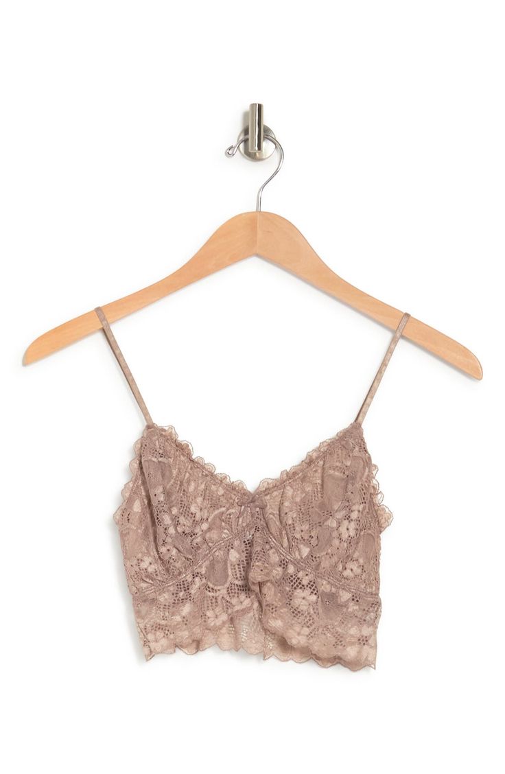 Delicate lace plays up the romantic charm on this soft cup bralette styled with dainty spaghetti straps. 90% nylon, 10% spandex
 Machine wash cold, lay flat to dry
 Imported Elegant Camisole Bra For Spring, Feminine Camisole Bra With Delicate Straps, Feminine Camisole Style Bra With Delicate Straps, Spring Camisole Bra With Delicate Lace, Elegant Spaghetti Straps Bra For Spring, Lace Cami Bra With Delicate Straps, Lace Camisole Bra With Delicate Straps, Lace Bra With Lace Closure For Spring, Spring Lace Bra With Lace Closure