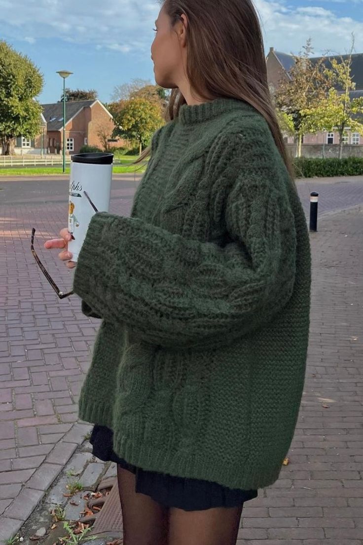 This is the long, trendy, and on budget knit sweater to have for a cozy and warm winter ✨ 🪐#Winteroutfits #Winterfashions2023 #knitsweater #inexpensive #Falloutfits Big Cozy Sweaters, Chunky Green Sweater, Big Sweaters Aesthetic, Forest Green Fall Outfit, Baggy Jumper Aesthetic, Forest Green Aesthetic Outfit, Big Sweater Outfit Aesthetic, Cable Knit Sweater Dress Outfit, Dark Green Knit Sweater Outfit