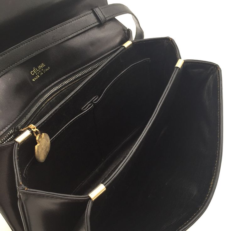 "100% Authentic Celine Vintage Horse Carriage Shoulder Bag - Material: Leather - Hardware: Gold hardware, signs of use - Color: Black - Genuine leather shoulder strap - Signed: \"CELINE PARIS\" - Serial number reads: MADE IN ITALY - Inside: B, some signs of use - Outside: AB, Some signs of used - Size approx.: L25 H17 D4 cm - Shoulder strap drop max 40 cm - Come with: Nothing - Condition: B Description of Grade N : New S : Unused SA : Less frequently used items A : There is a little feeling, goo Designer Travel Saddle Bag With Detachable Handle, Luxury Flap Shoulder Bag For Travel, Designer Flap Bag With Detachable Handle For Travel, Designer Travel Flap Bag With Detachable Handle, Luxury Saddle Bag With Adjustable Strap For Formal Occasions, Luxury Formal Saddle Bag With Adjustable Strap, Designer Flap Bag With Detachable Strap For Travel, Classic Evening Bag With Flap, Designer Saddle Bag For Office