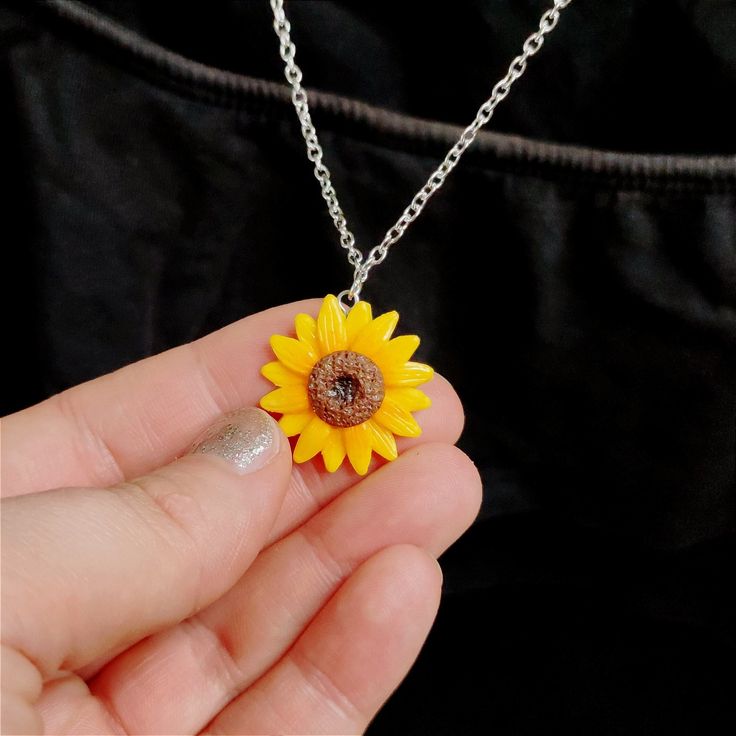 This Sunflower Necklace is the prettiest, one of a kind jewelry that you have been looking for! If you want to wear a cute Sunflower Pendant Necklace or just searching for the perfect gift for a sunflower lover, then you have came to the right place! D E T A I L S: * Handmade Sunflower Necklace * Made from Polymer Clay * Necklace length: 19.7 inches (50 cm) - Do you prefer a different chain length ? Please let me know in a message! * Sunflower dangle width: 1 inches (2.5 cm) * Chain material: St Eco Gift Wrapping, Handmade Sunflower, Cute Sunflower, Sunflower Jewelry, Sunflower Gifts, Sunflower Pendant, Sunflower Necklace, Necklace Flower, Wear Necklaces